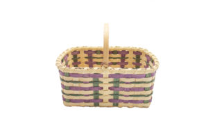 A purple and green market basket created by 'Round the Mountain artisan Amanda Sprinkle.