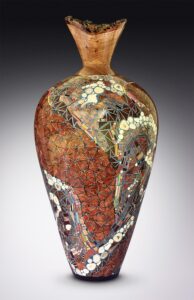 wooden vase with metal inlay created by Nicholas Barnes